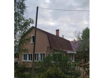 Отделка фасада виниловым сайдингом